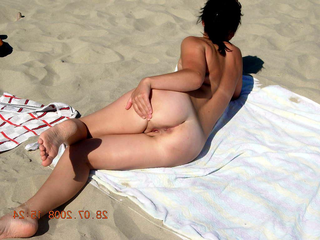15P Busty brunette rubs her perfectly tanned nude body