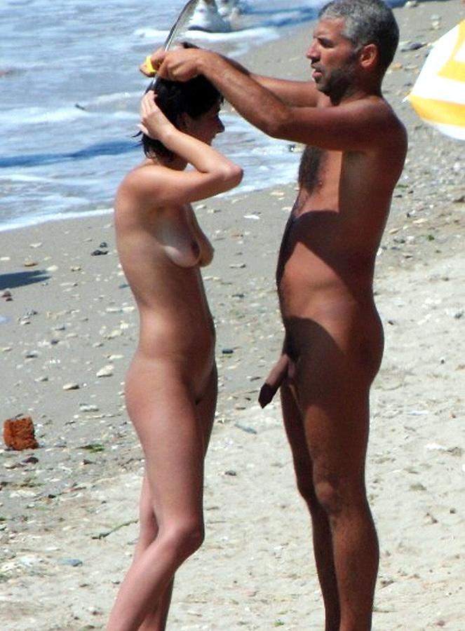 15P Hot Russian nudist strips her bikini off here