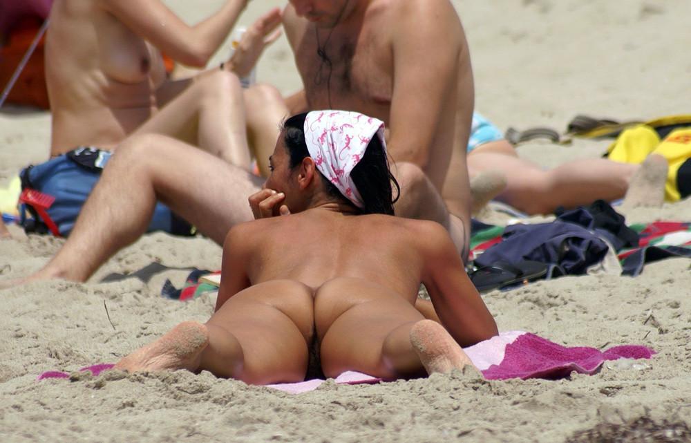 15P Hot Russian nudist strips her bikini off here