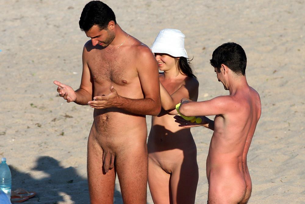 15P Hot Russian nudist strips her bikini off here