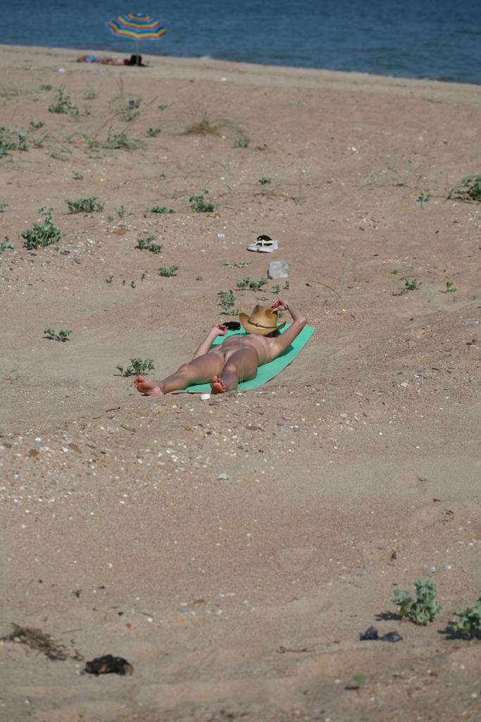 15P Sexy nudist teen strips down to tan her nude body