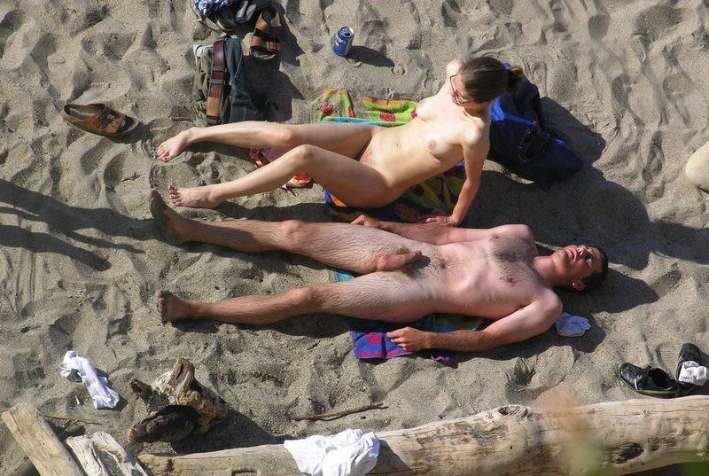 15P Her long slim nude body looks great in the sun