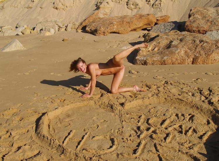 15P Wild naked chick has a great time at a nude beach