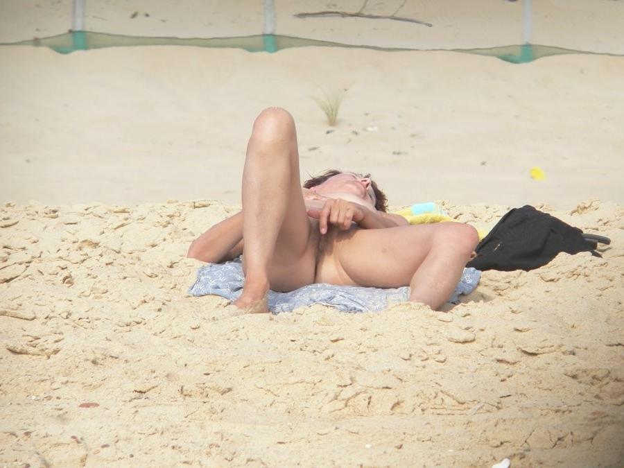 15P She wants to feel the hot sand on her naked body