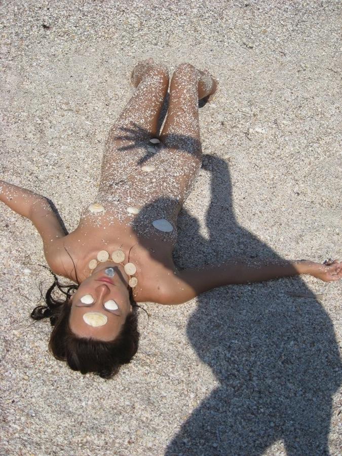 15P She wants to feel the hot sand on her naked body