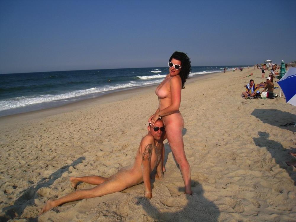 15P The water feels good on these nudist's bare skin