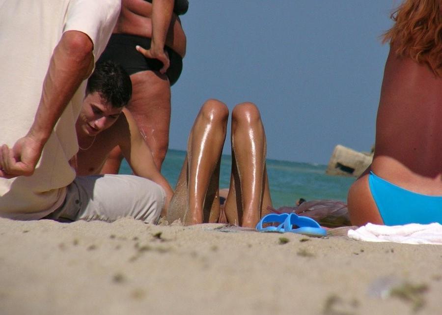 15P Watch the tits in the water from this nudist teen
