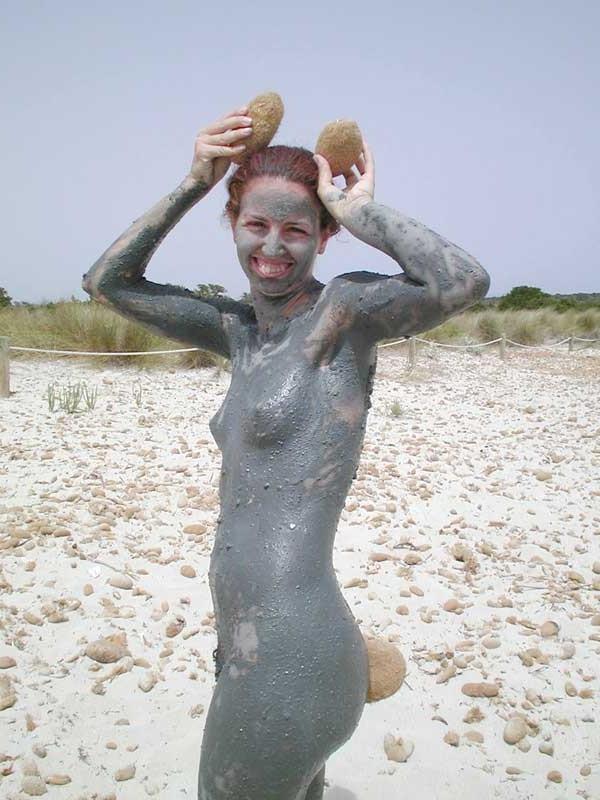 15P Watch this sexy brunette babe lay in the water naked