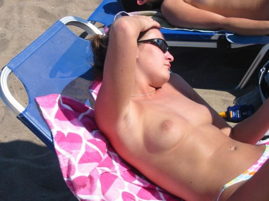 15P She enjoys the feel of warm water on her nude body