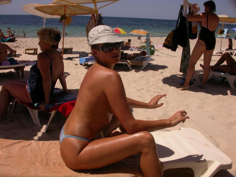 15P She enjoys the feel of warm water on her nude body