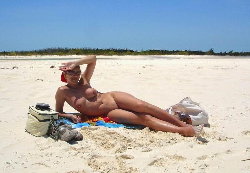 15P Brunette nudist loves feeling the sun on her body
