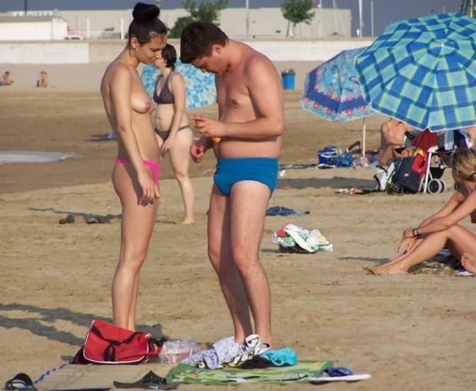 15P Watch the tits in the water from this nudist babe