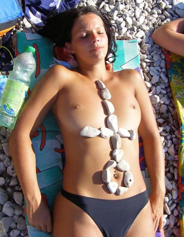 15P The water feels good on these nudist's bare skin