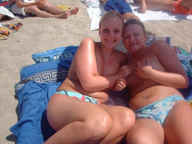 15P Her sexy body gets a tan after she strips naked