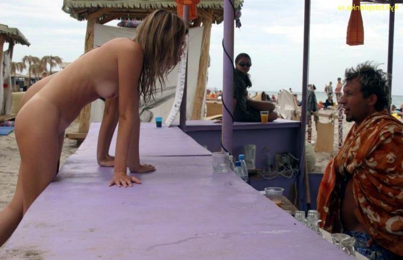 15P Watch this sexy blonde teen lay in the water naked