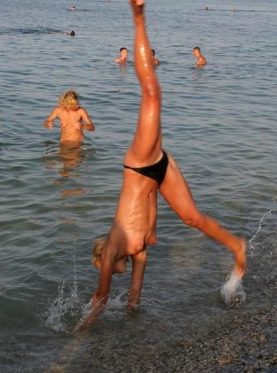 15P She wants to feel the hot sand on her naked body