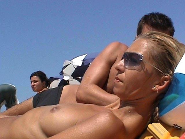 15P She wants to feel the hot sand on her naked body
