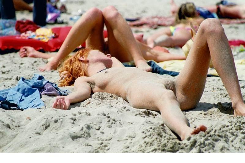 15P She wants to feel the hot sand on her naked body