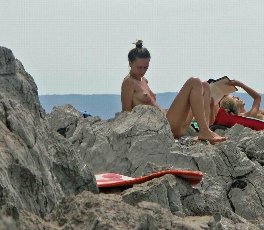 15P Hot Russian nudist strips her bikini off here
