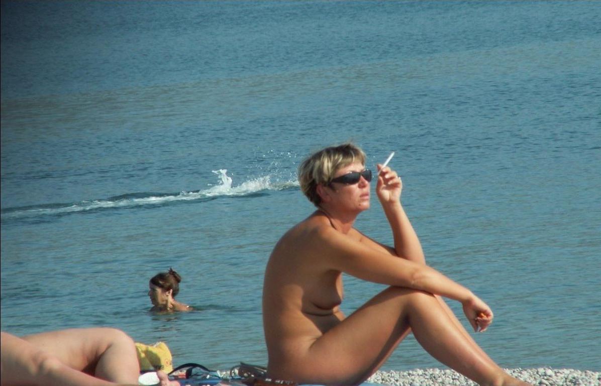15P Slim nudist teen shows off her tiny teen titties