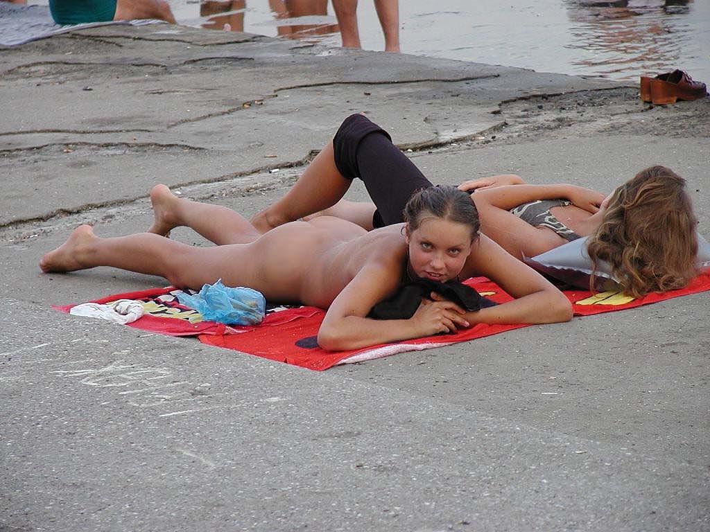 15P Slim nudist teen shows off her tiny teen titties