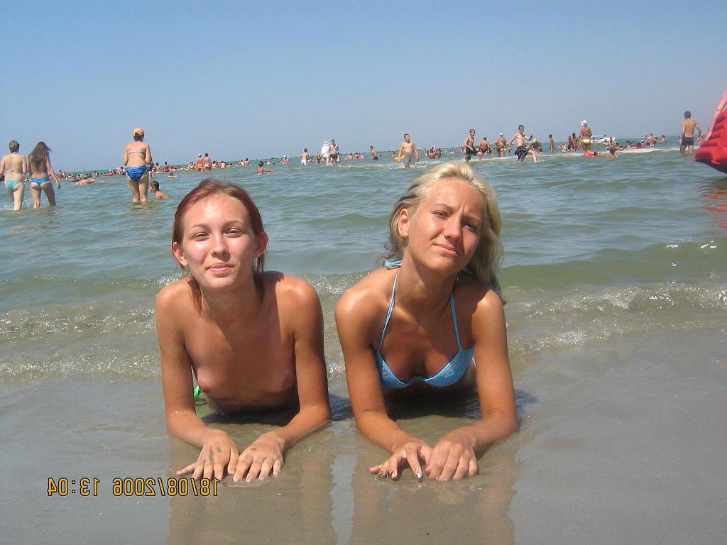15P These two teens rub lotion on each other's bodies