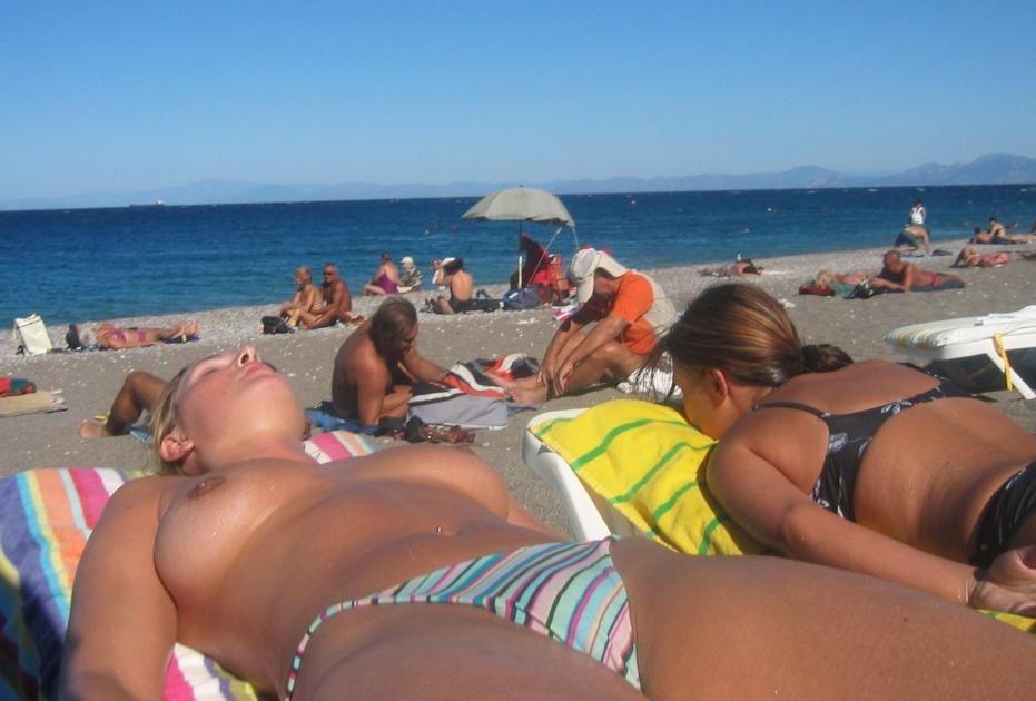 15P She enjoys the feel of warm water on her nude body