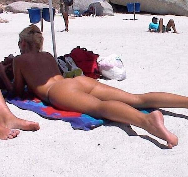 15P Look at this slim Russian nudist getting a tan