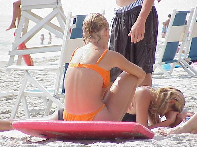 15P Hot days call for teen nudeness on the warm sand