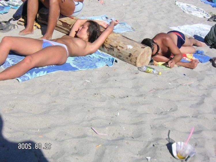 15P Barely legal nudist beach teen tans her whole body