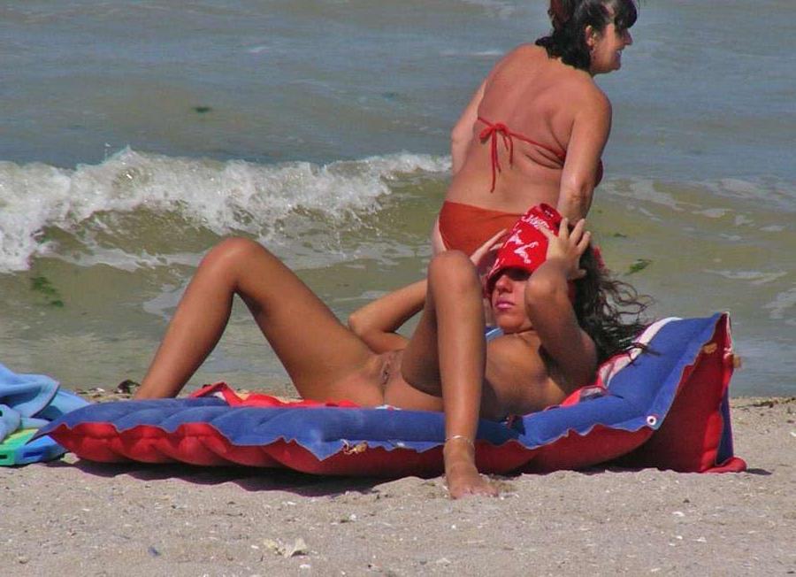 15P Barely legal nudist beach teen tans her whole body