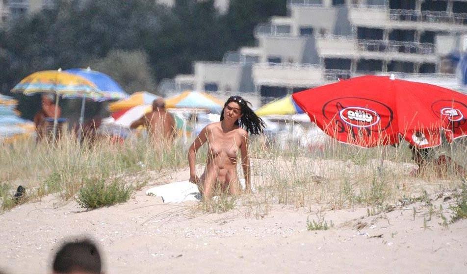 15P Barely legal nudist beach teen tans her whole body
