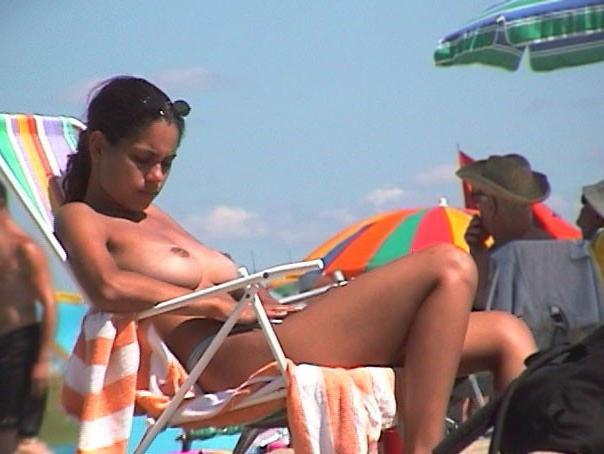 15P Gorgeous nude teen with a nice ass sunbathes