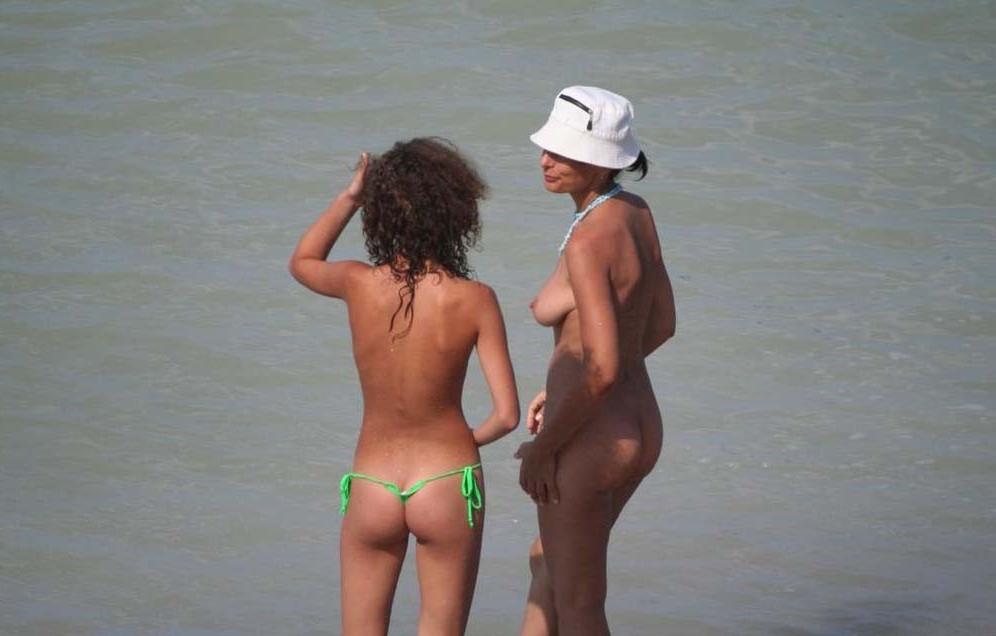 15P Naked teen nudist lets the water kiss her body