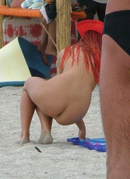 15P Slim nudist teen strips down to tan her nude body