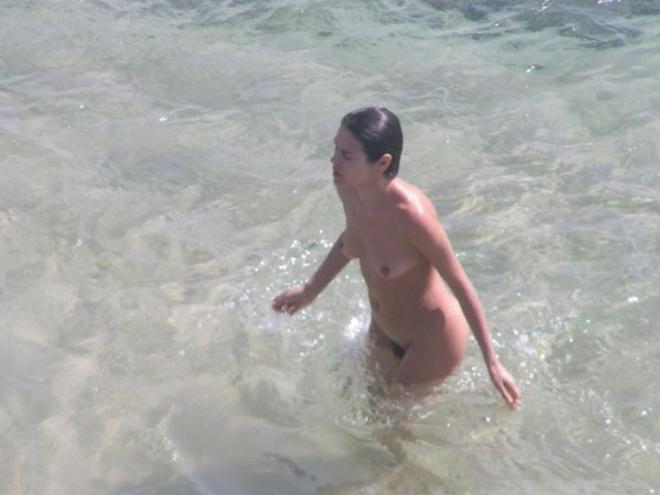 15P Slim nudist teen strips down to tan her nude body