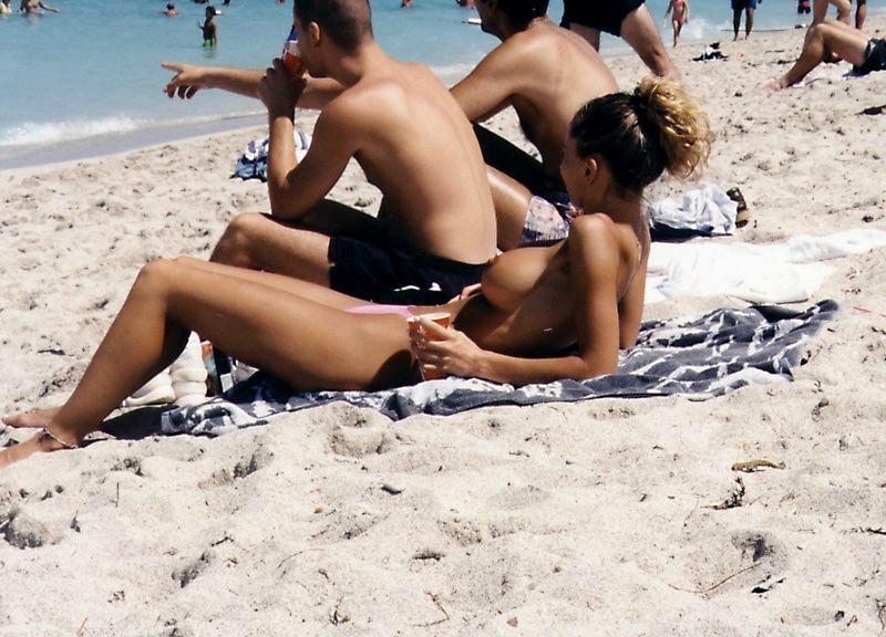 15P Hot Russian nudist strips her bikini off here