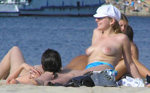 15P Hot Russian nudist strips her bikini off here