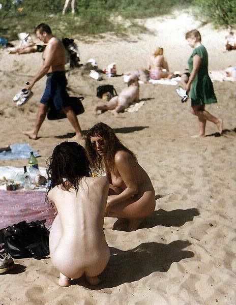 15P Hot Russian nudist strips her bikini off here