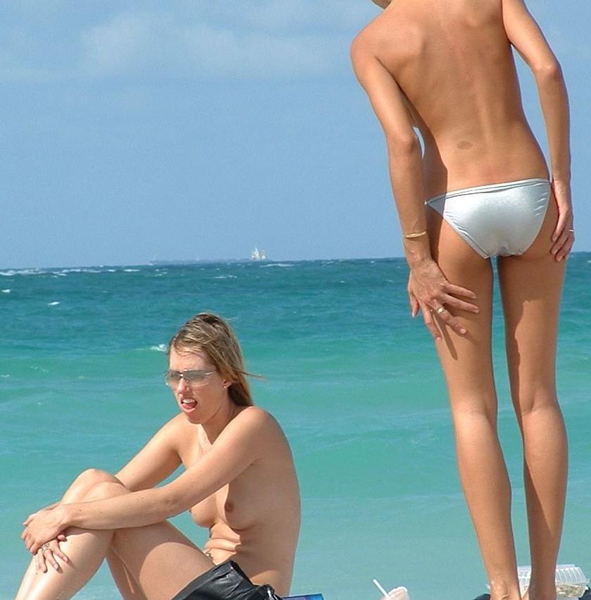 15P Hot Russian nudist strips her bikini off here