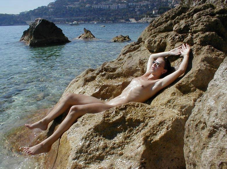 15P Slim nudist teen shows off her tiny teen titties