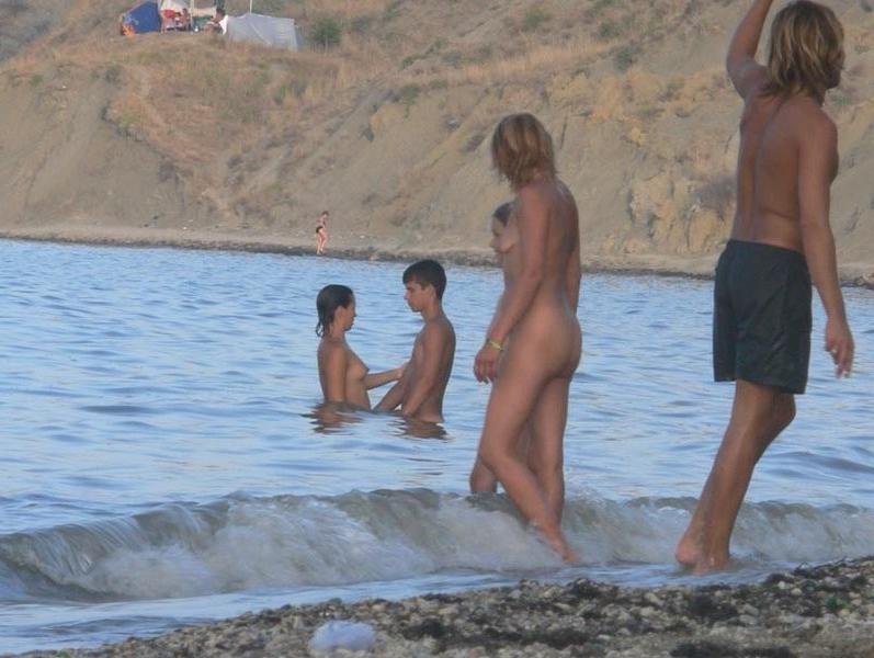 15P These two teens rub lotion on each other's bodies