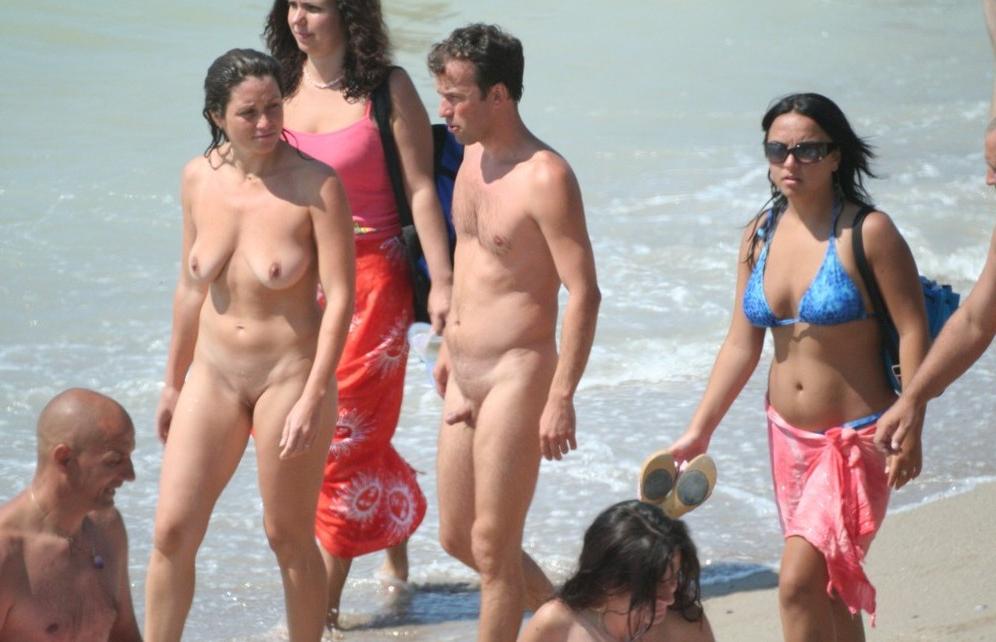 15P The water feels good on these nudist's bare skin