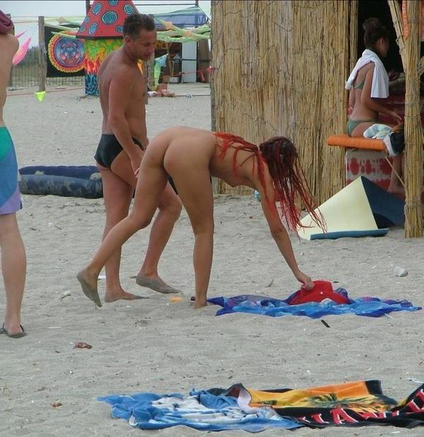 15P The water feels good on these nudist's bare skin