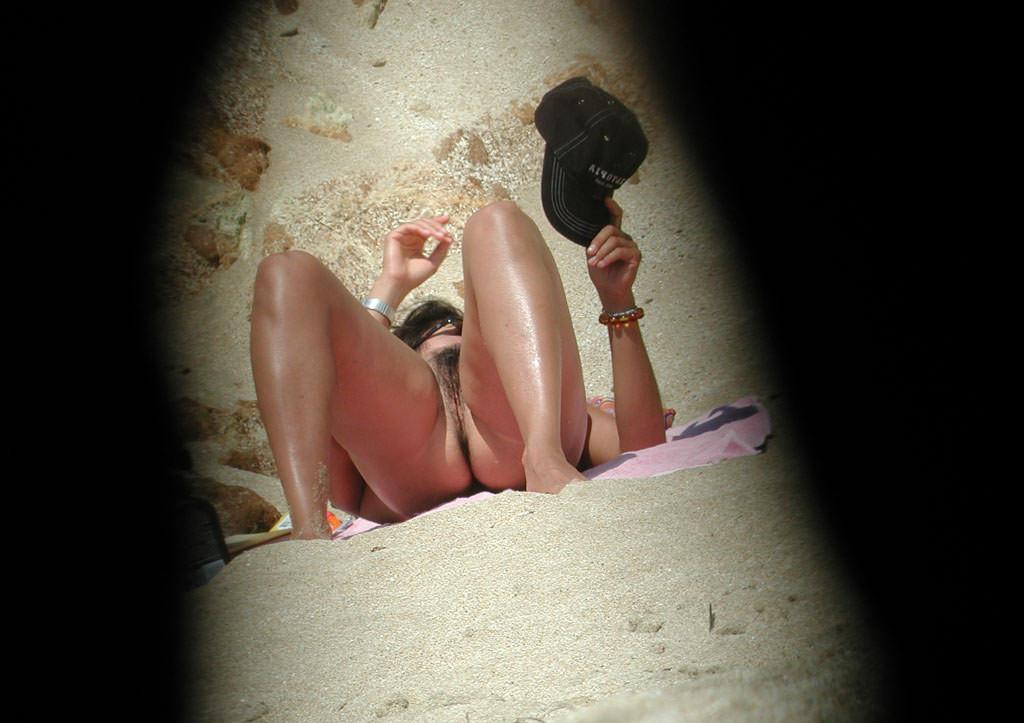 15P Big breasted blonde Russian nudist sunbathes naked