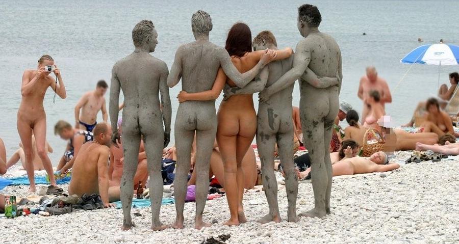 15P Big breasted blonde Russian nudist sunbathes naked