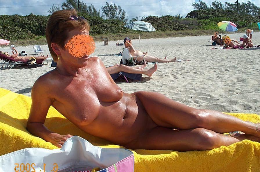 15P Hot blonde nudist doesn't hide her sexy naked body