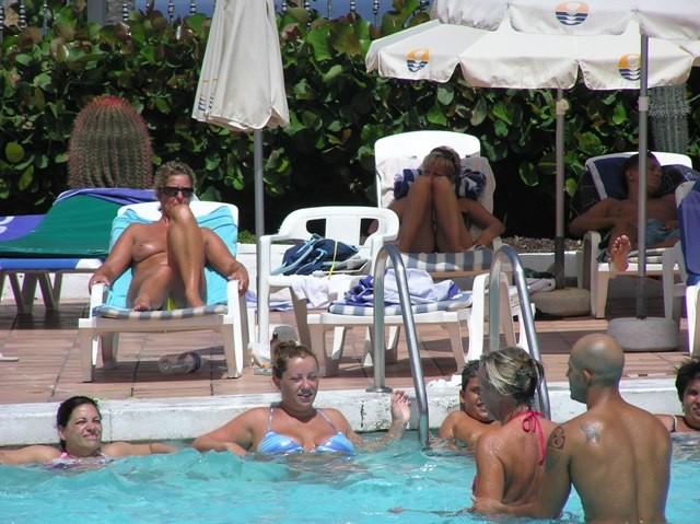 15P The heat doesn't affect this nude sunbathing chick