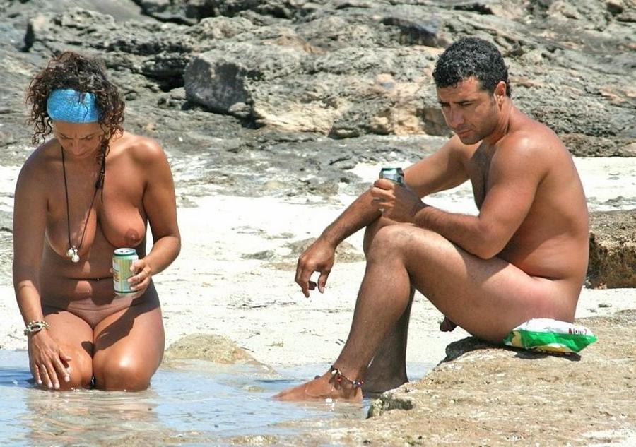 15P Slim young nudist smokes on a warm summer's day