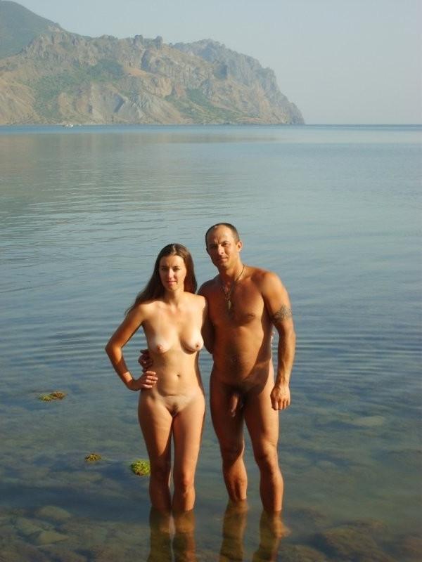 15P Slim young nudist smokes on a warm summer's day